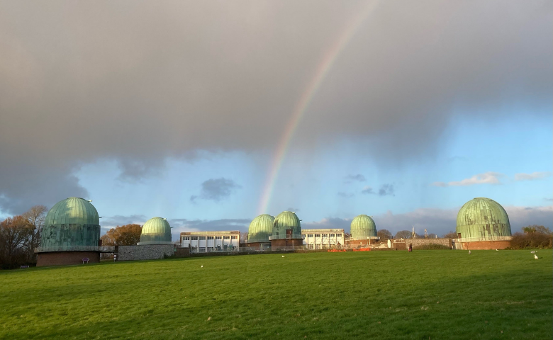 A rainbow over the astronomy domes of the Observatory Science Centre in West Sussex