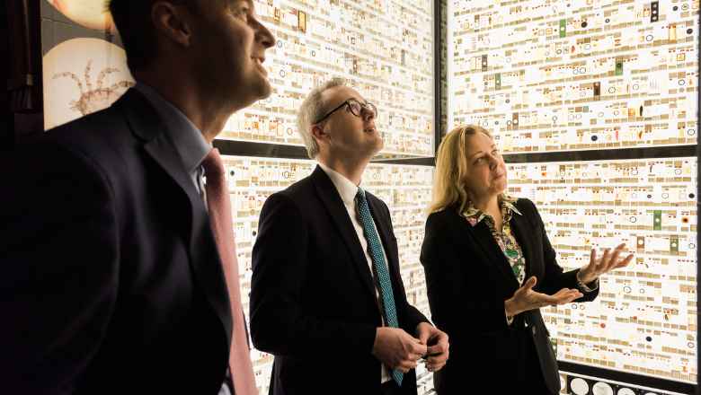 Paul Ramsbottom, CEO Wolfson Foundation, Lord Parkinson Minister for Arts and Tannis Davidson, Head of Zoology and Science Collections, UCL examine the museum’s Micrarium displaying 2,323 tiny specimens mounted on 252 microscope slides